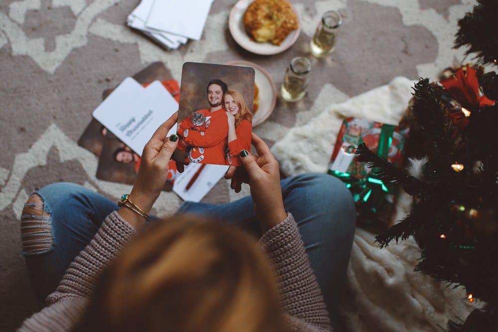 Chrismukkah holiday card with cat in sweater