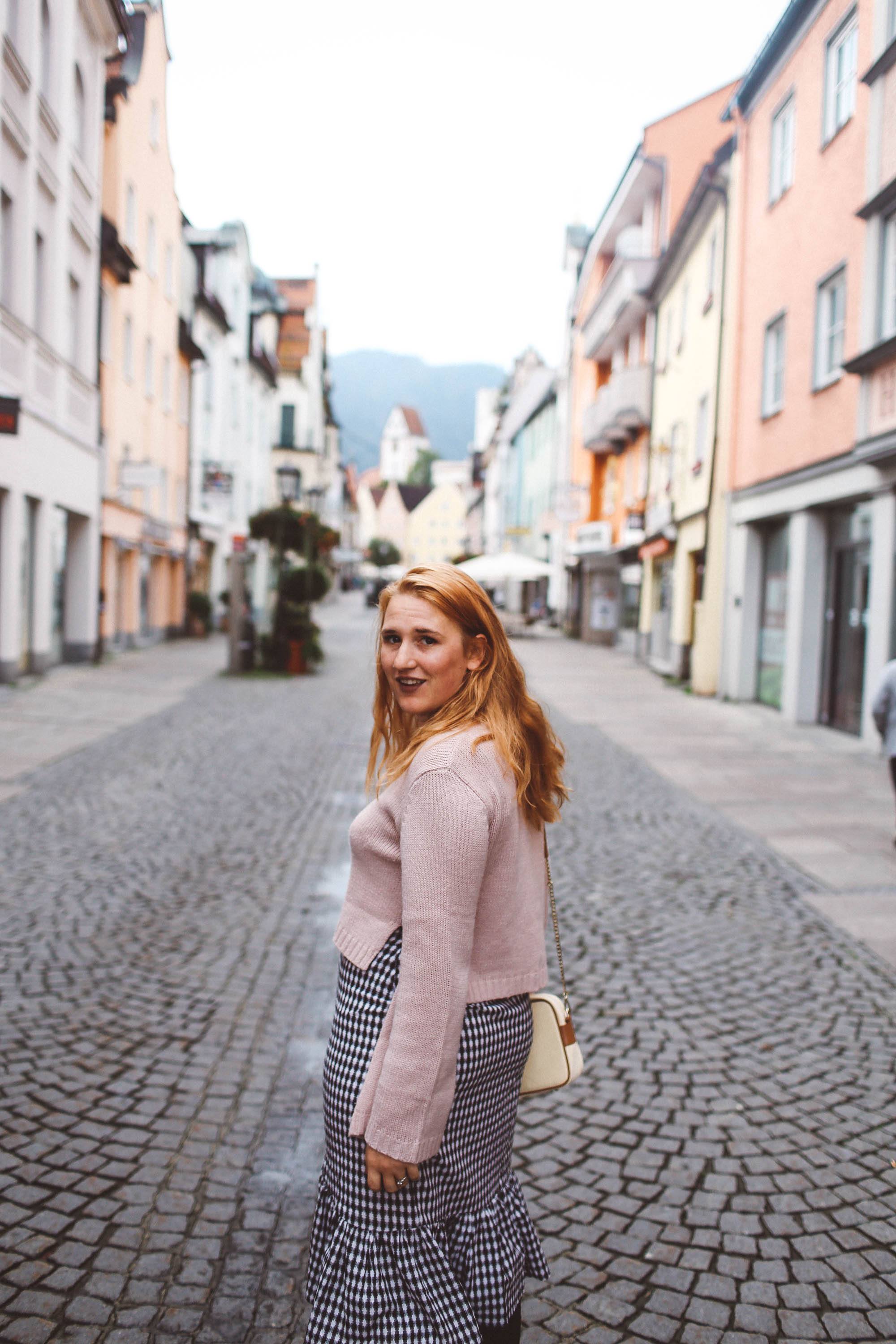 Füssen, Germany pink sweater gingham skirt