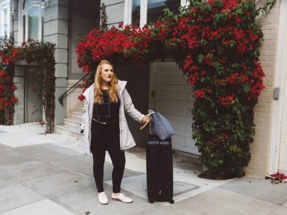 packing suitcase grey coat street leggings