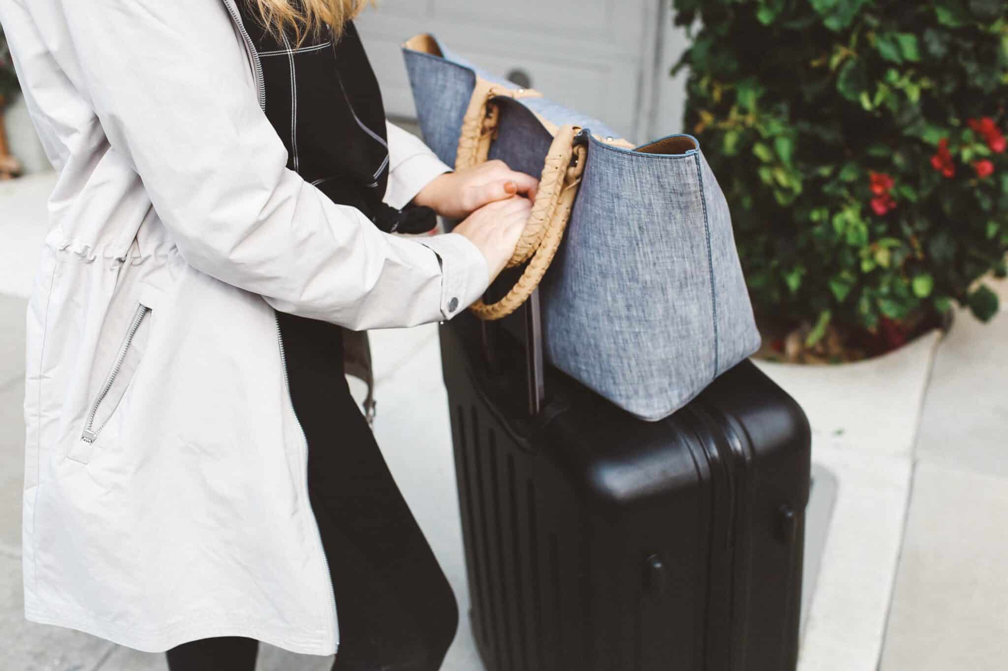 packing suitcase grey coat street leggings