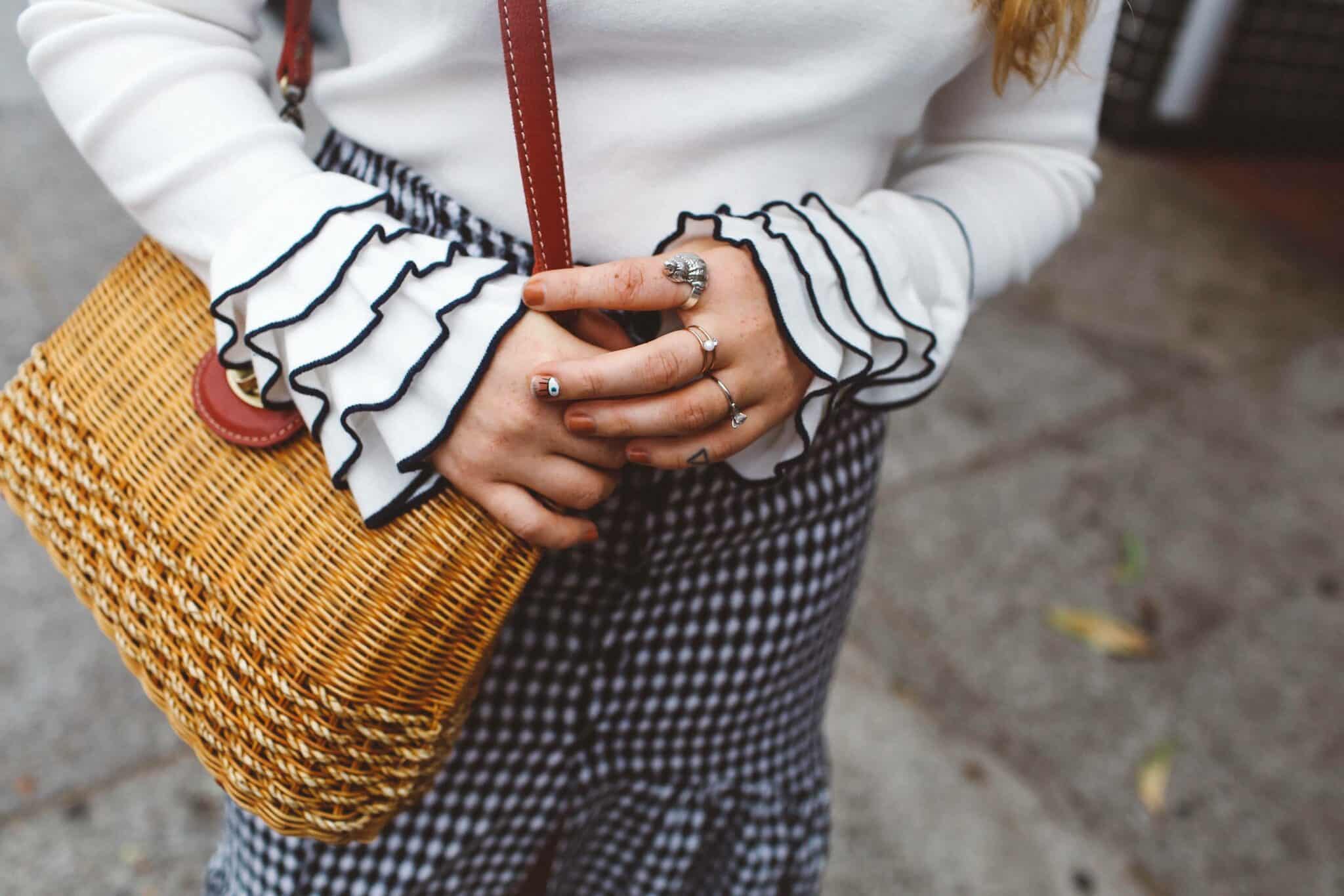 white sweater ruffles wicker purse 