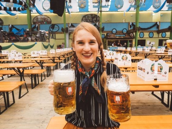 Oktoberfest Munich woman holding beer spaten