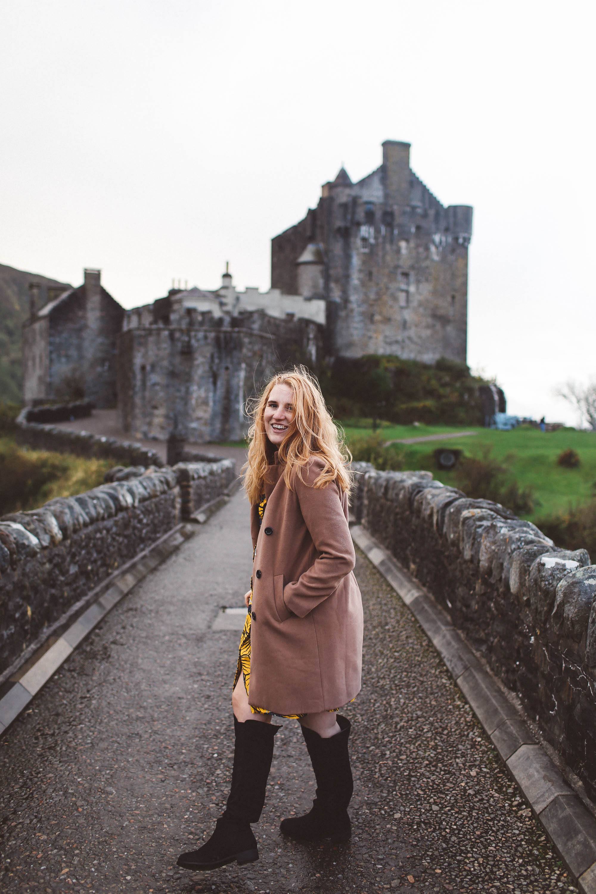 elieen donan castle scotland camel coat