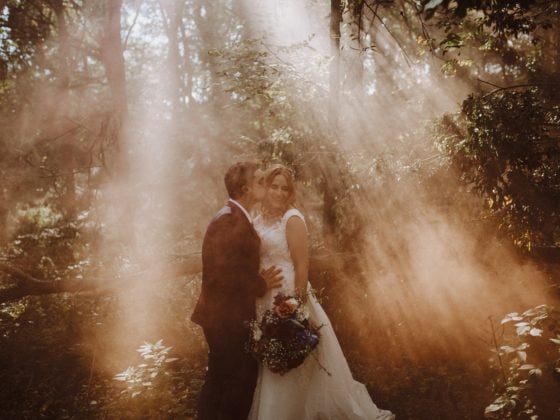 wedding smoke bombs woods bride groom