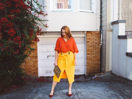 yellow wrap skirt red blouse leopard purse