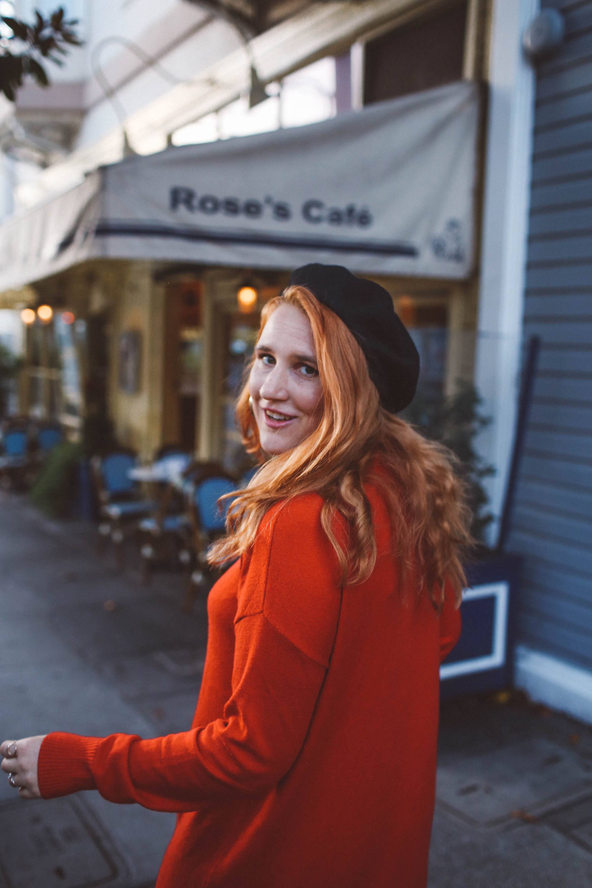 red sweater dress beret rose's cafe san francisco