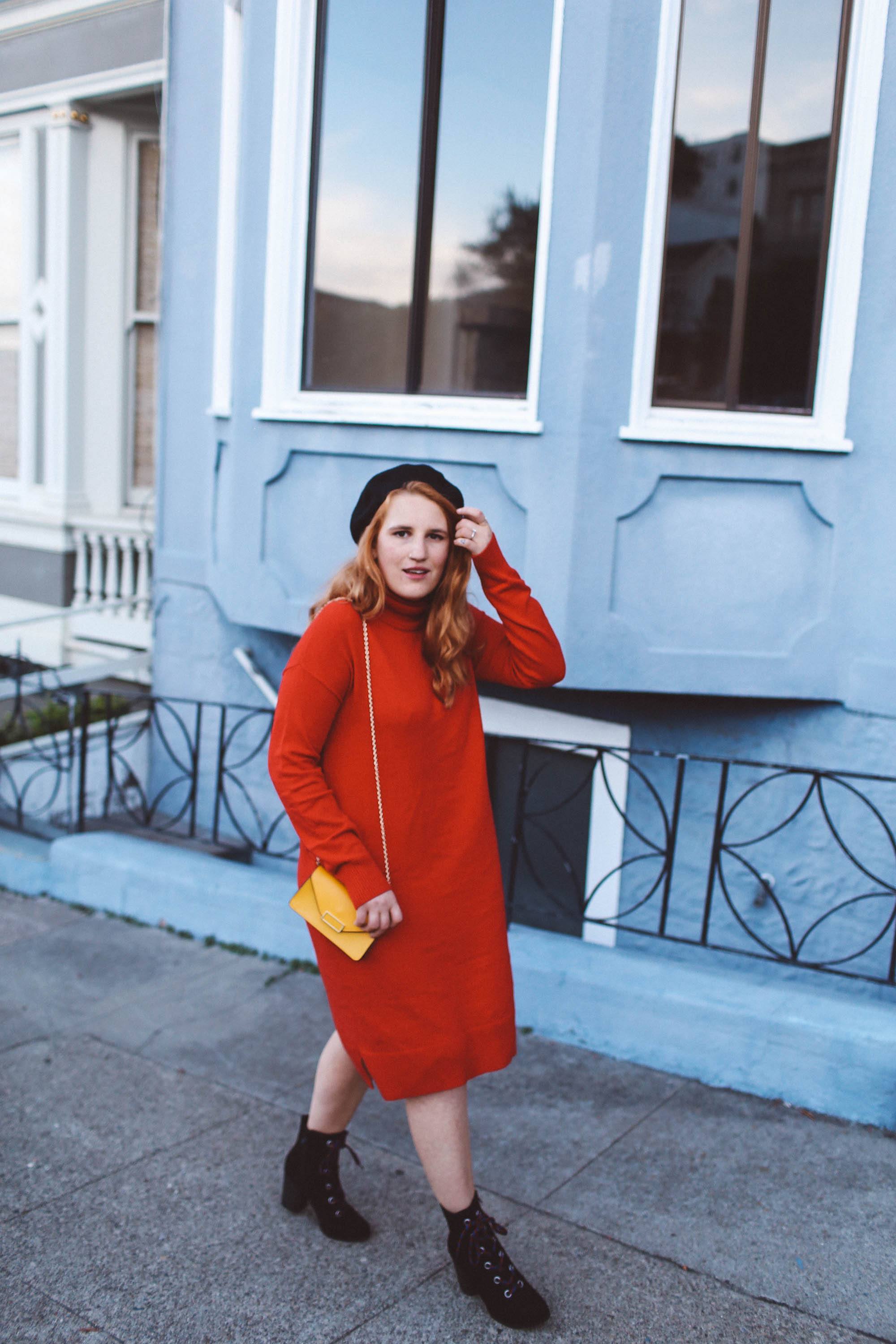 red sweater dress beret yellow purse combat boots