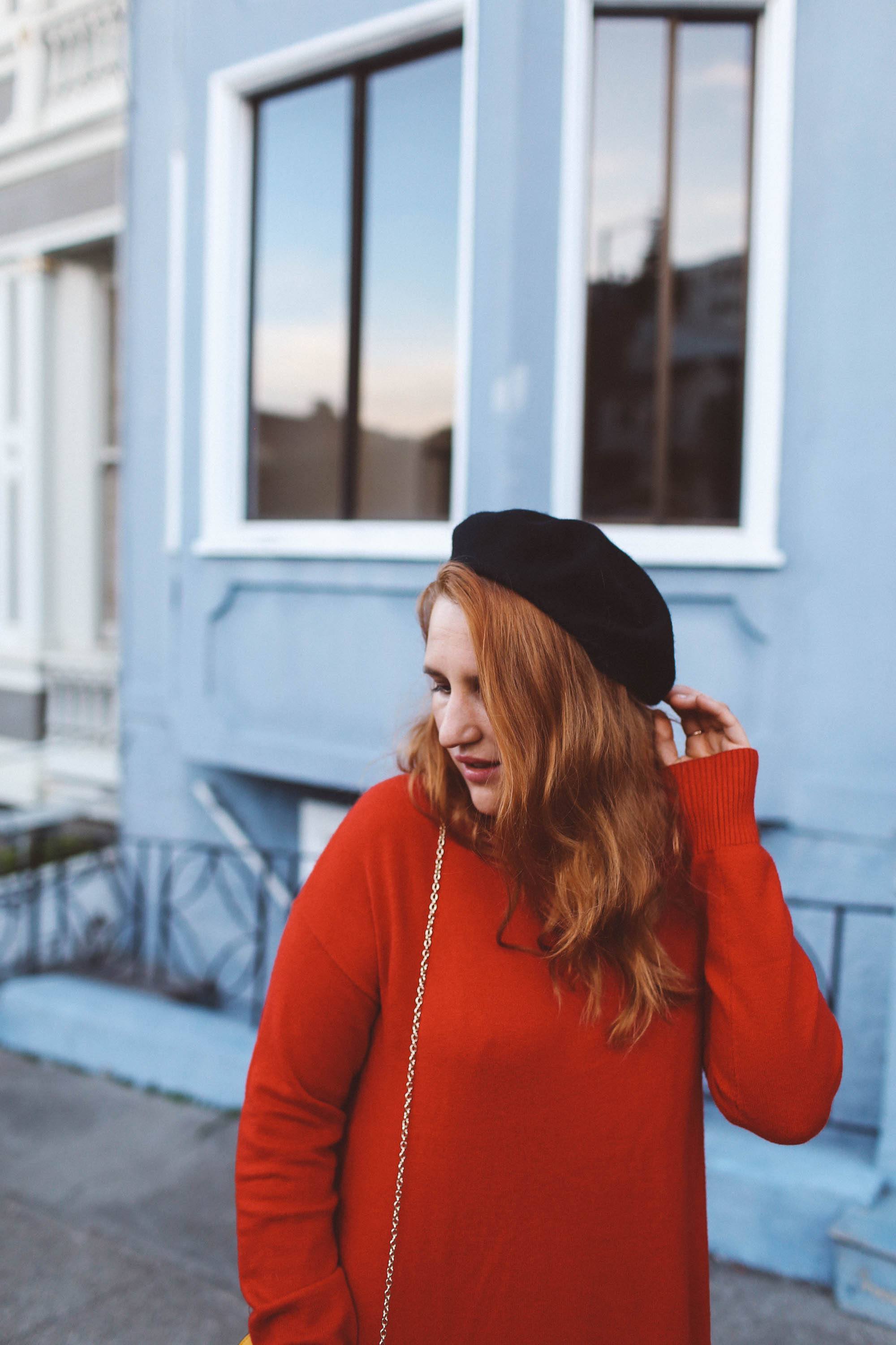 red sweater dress beret yellow purse combat boots