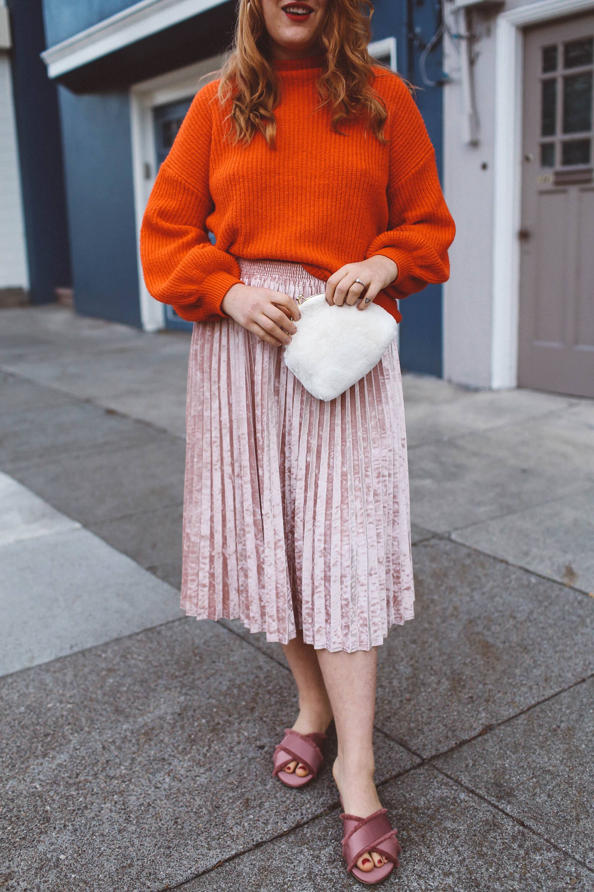 red sweater pink skirt woman white purse pink flats