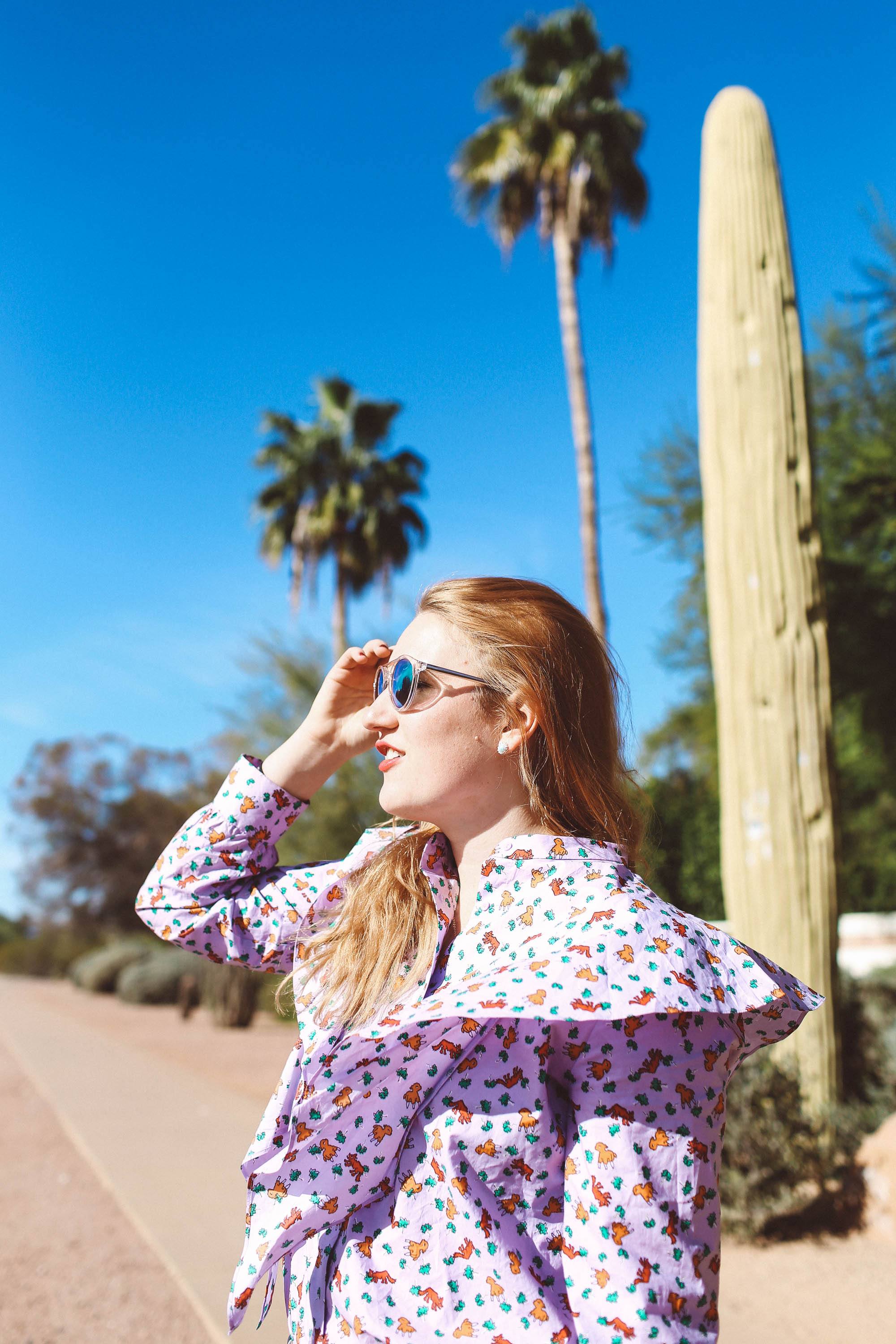 purple ruffle top pink bike palm trees