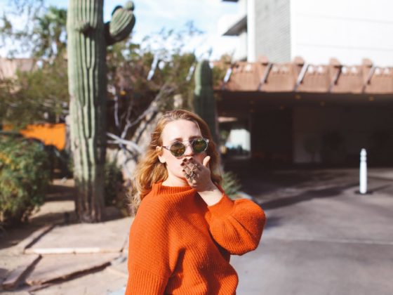 tan over the knee boots red sweater blue skirt