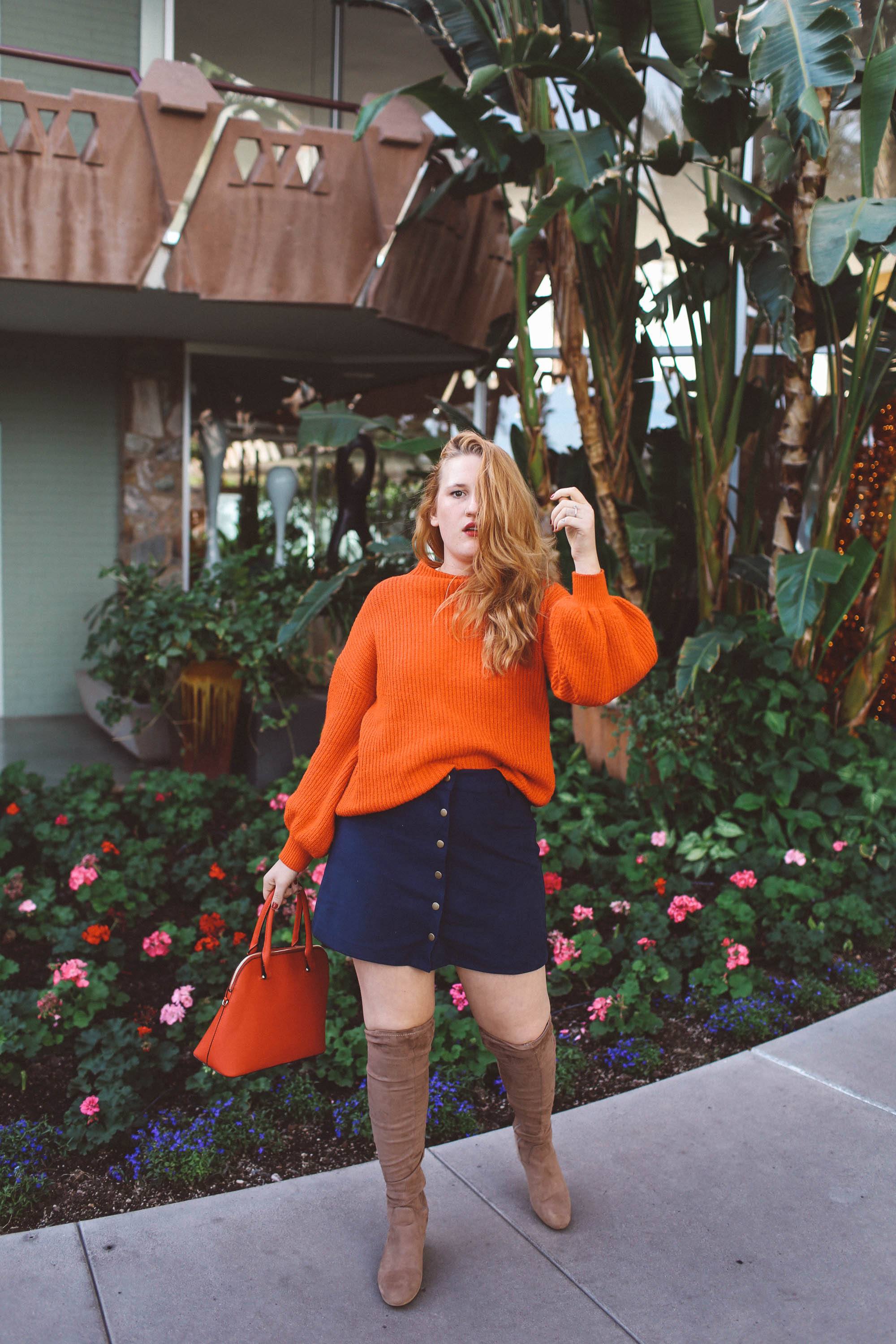 tan over the knee boots red sweater blue skirt