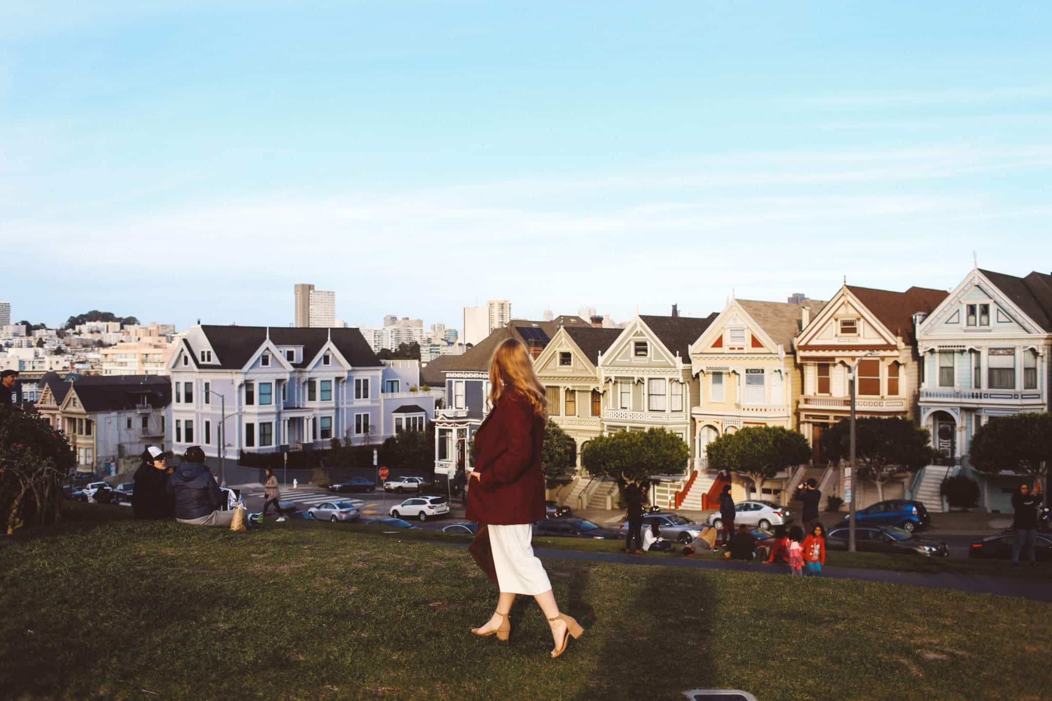 red coat white pants painted ladies