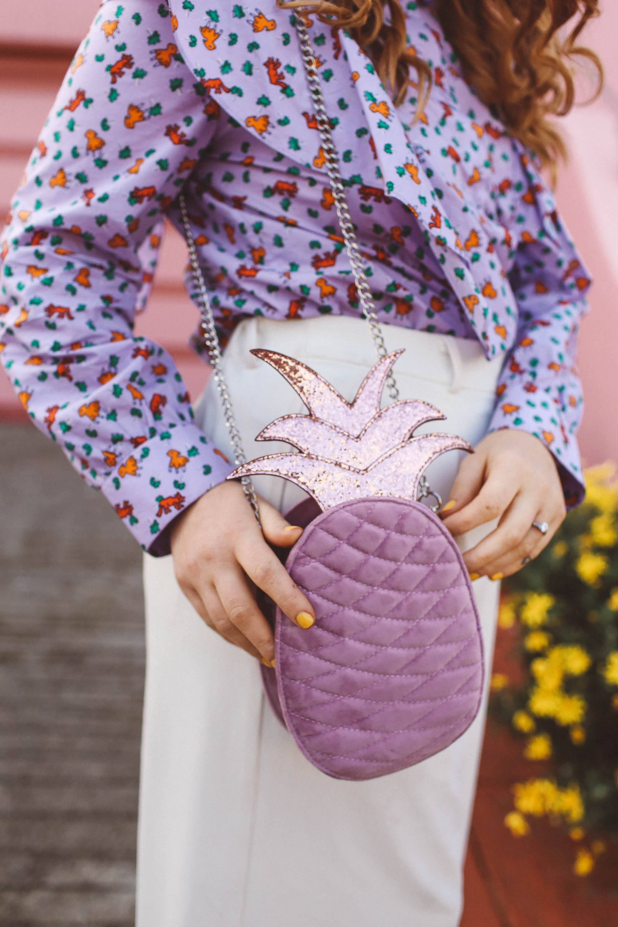 pineapple purse, purple ruffle shirt, pink house