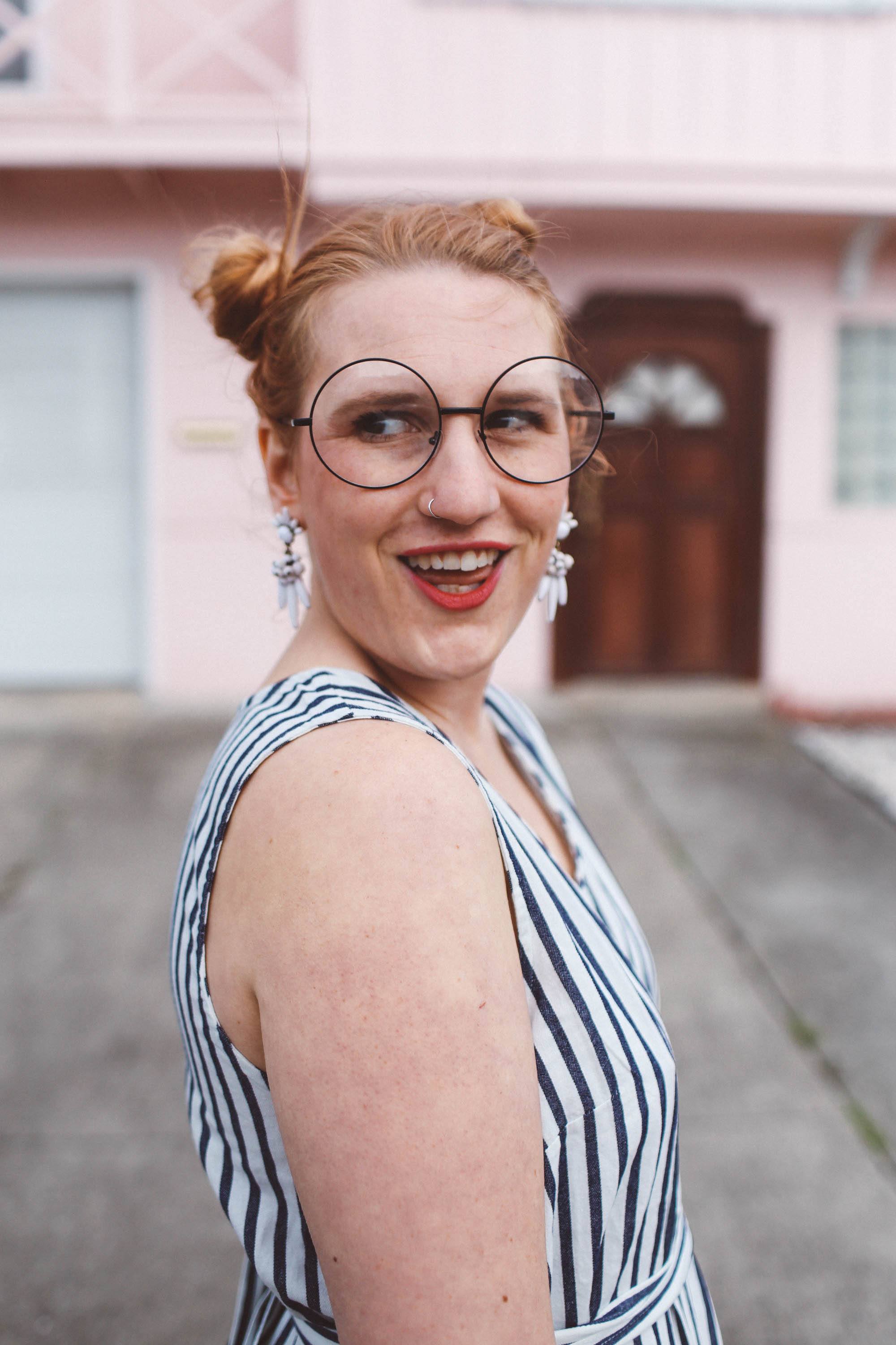 double bun round glasses long hairstyle