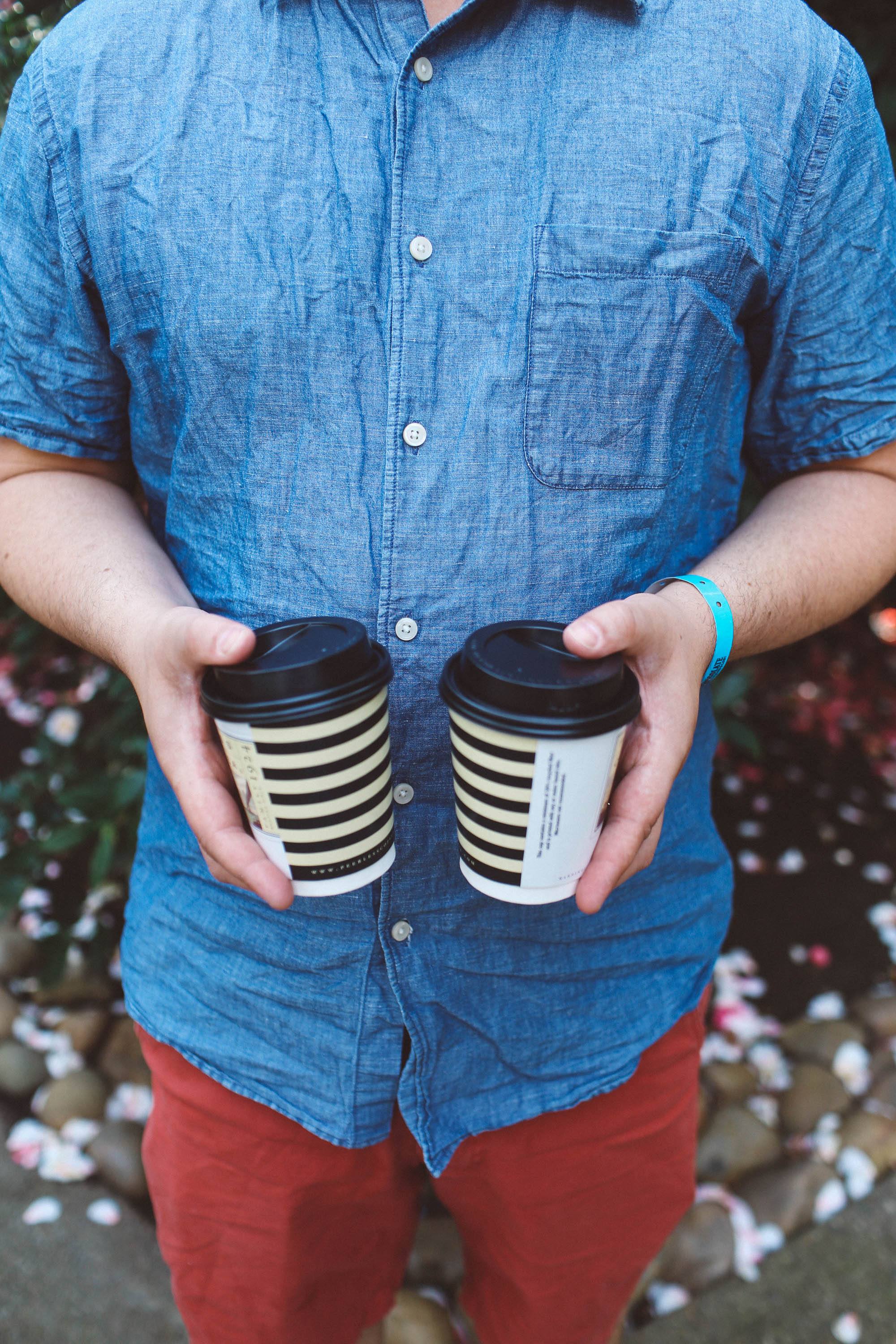 man holding coffee