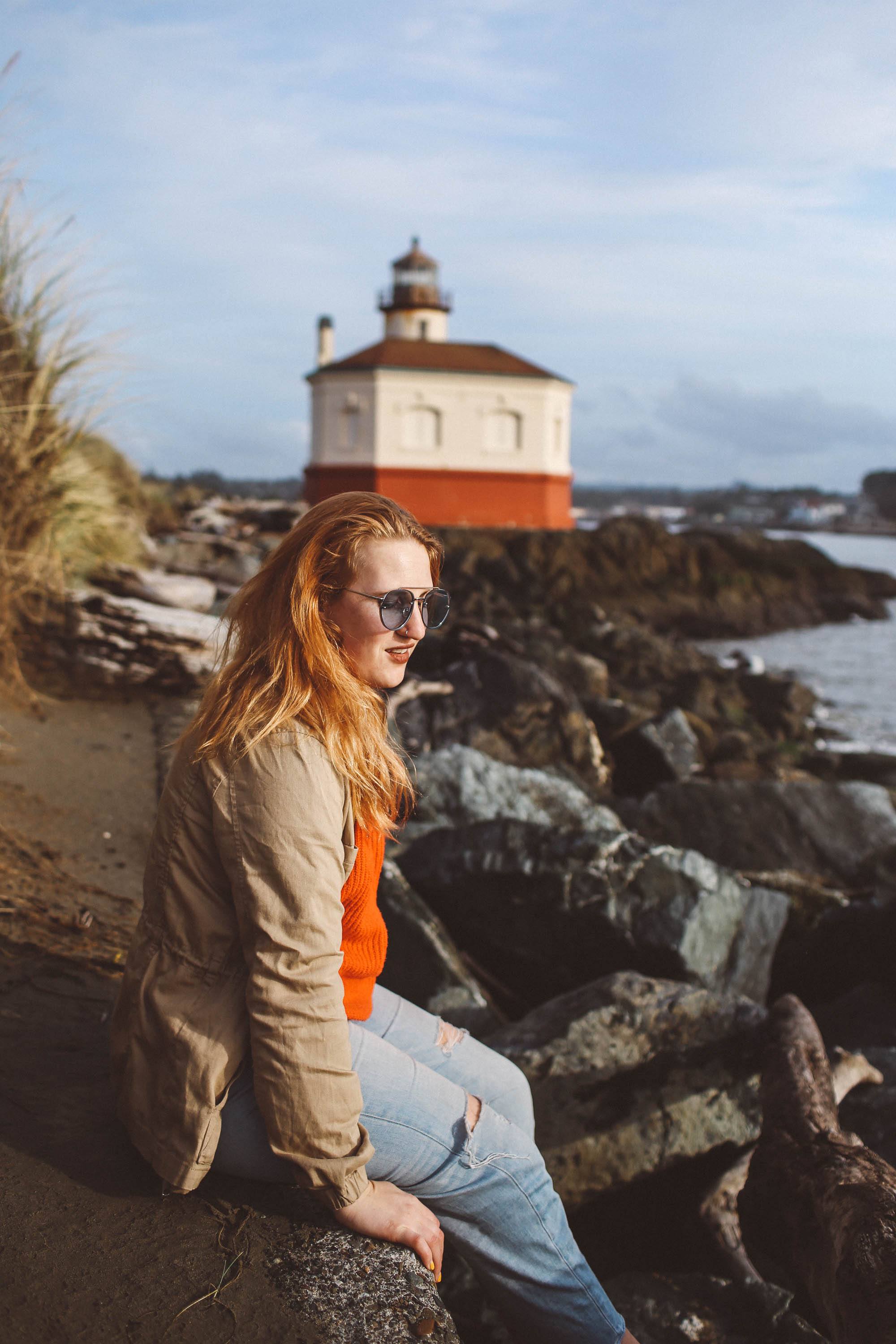 oregon lighthouse bandon woman red sweater