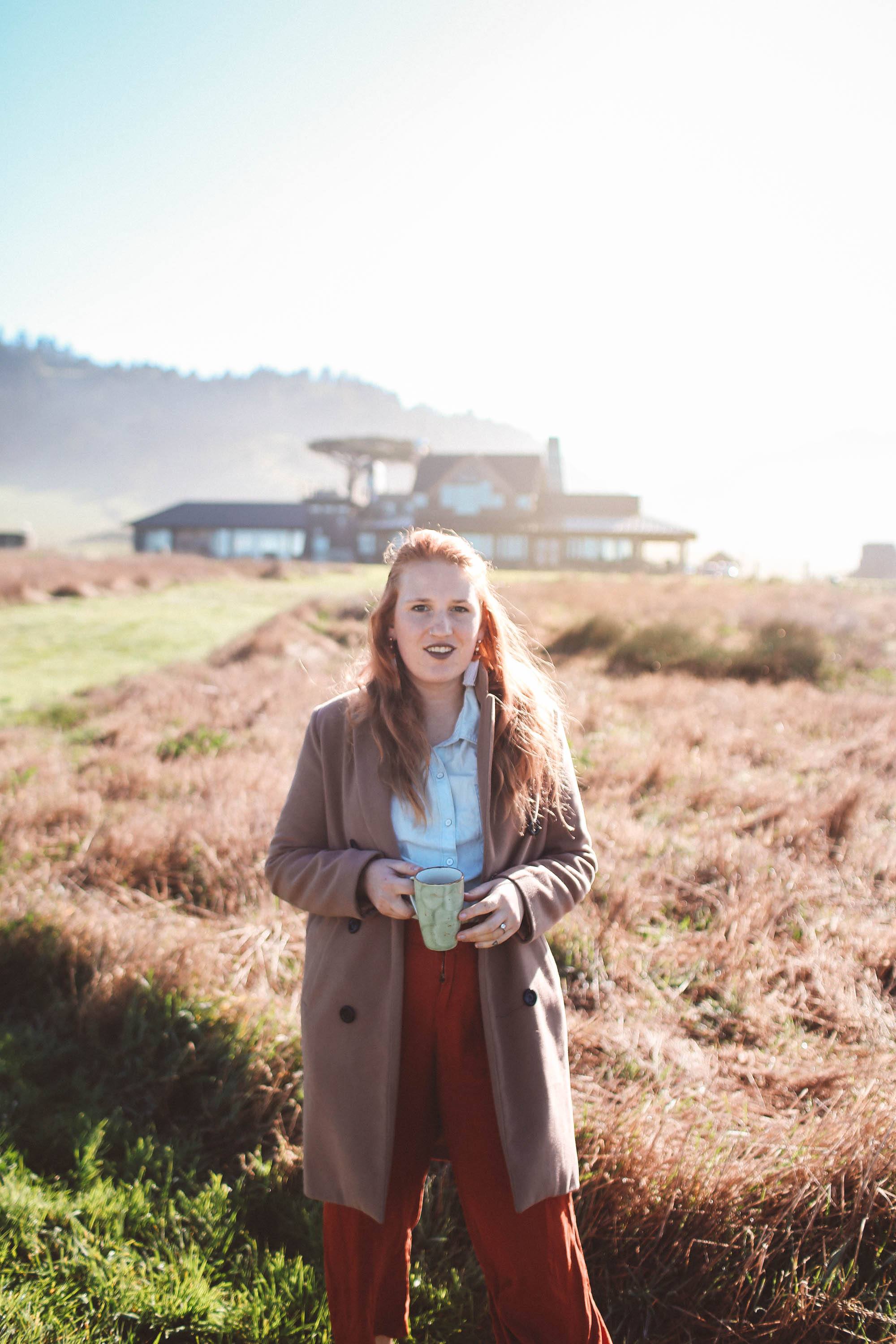 Woman drinking coffee at Newport Ranch in Mendocino