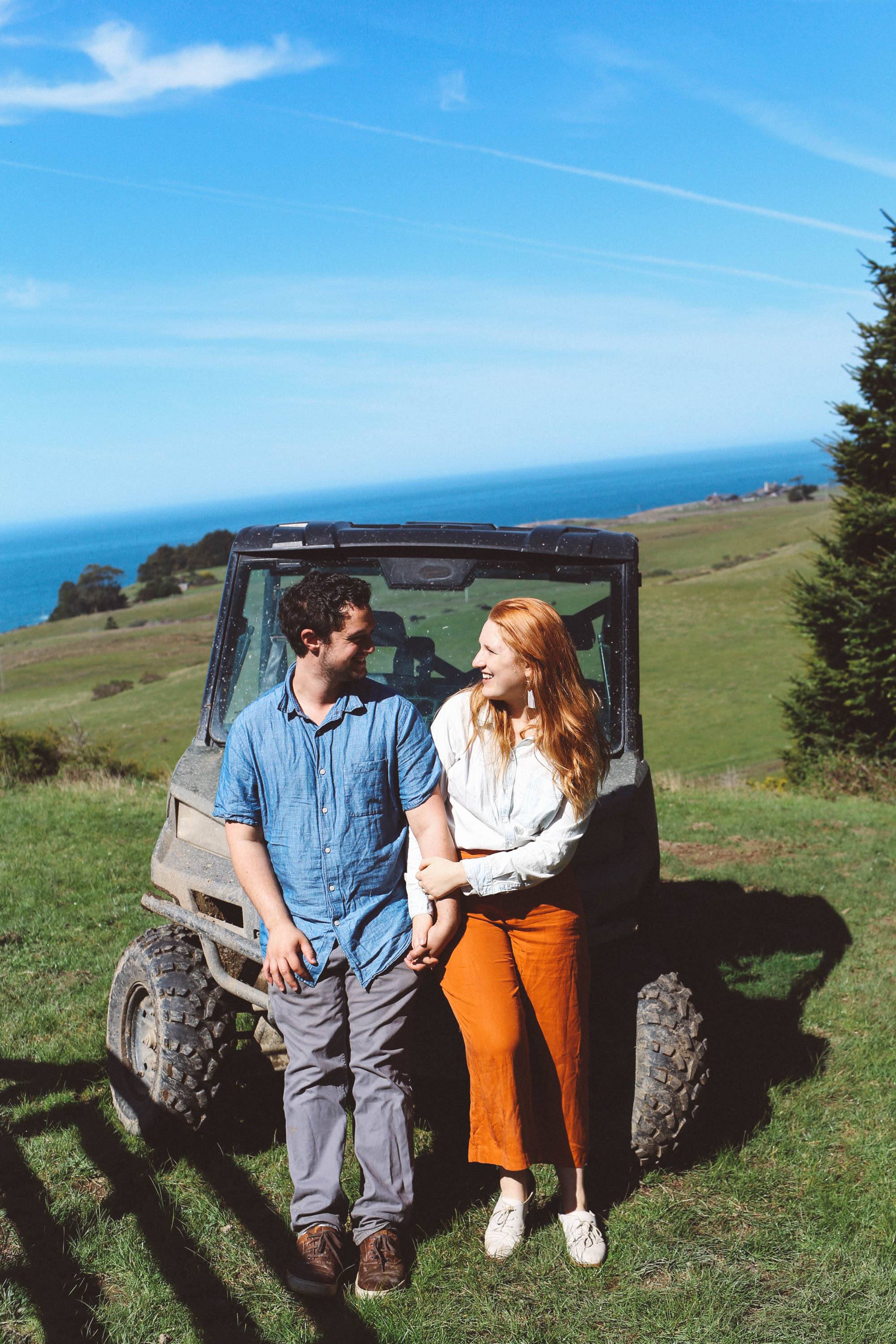 Man and Woman in front of an atv at Newport Ranch in Mendocino