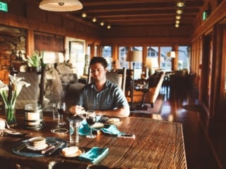 Man eating at the Newport Ranch in Mendocino