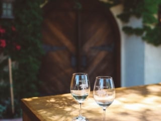 Wine glasses on a table at Grgich Hills Estate