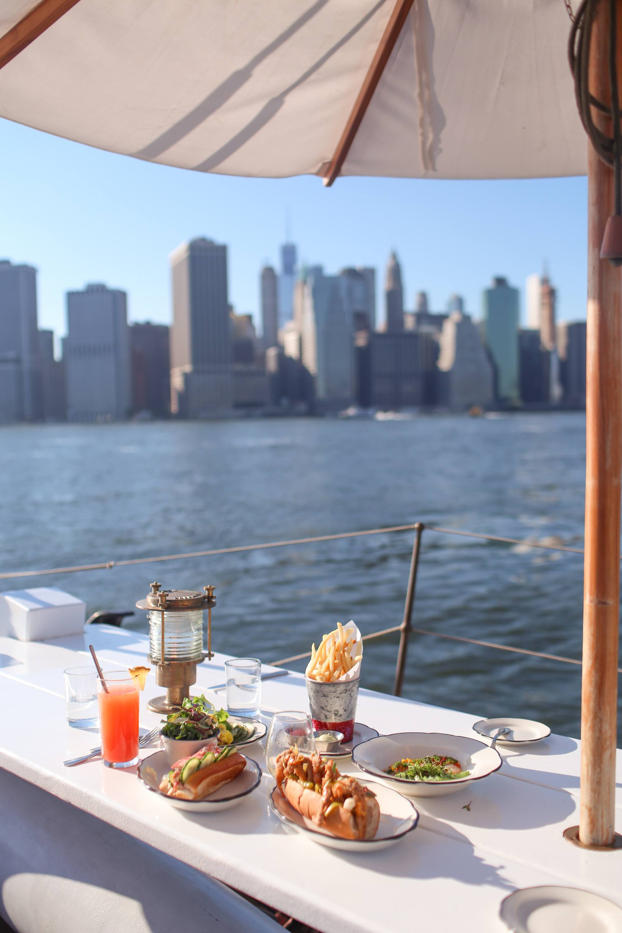 Food at Pilot, Manhattan in the background.