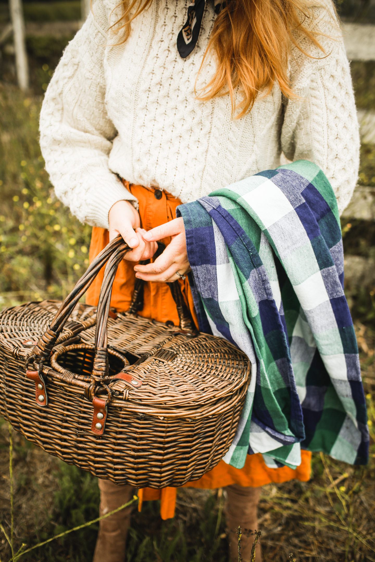 Woman holding a picnic basket