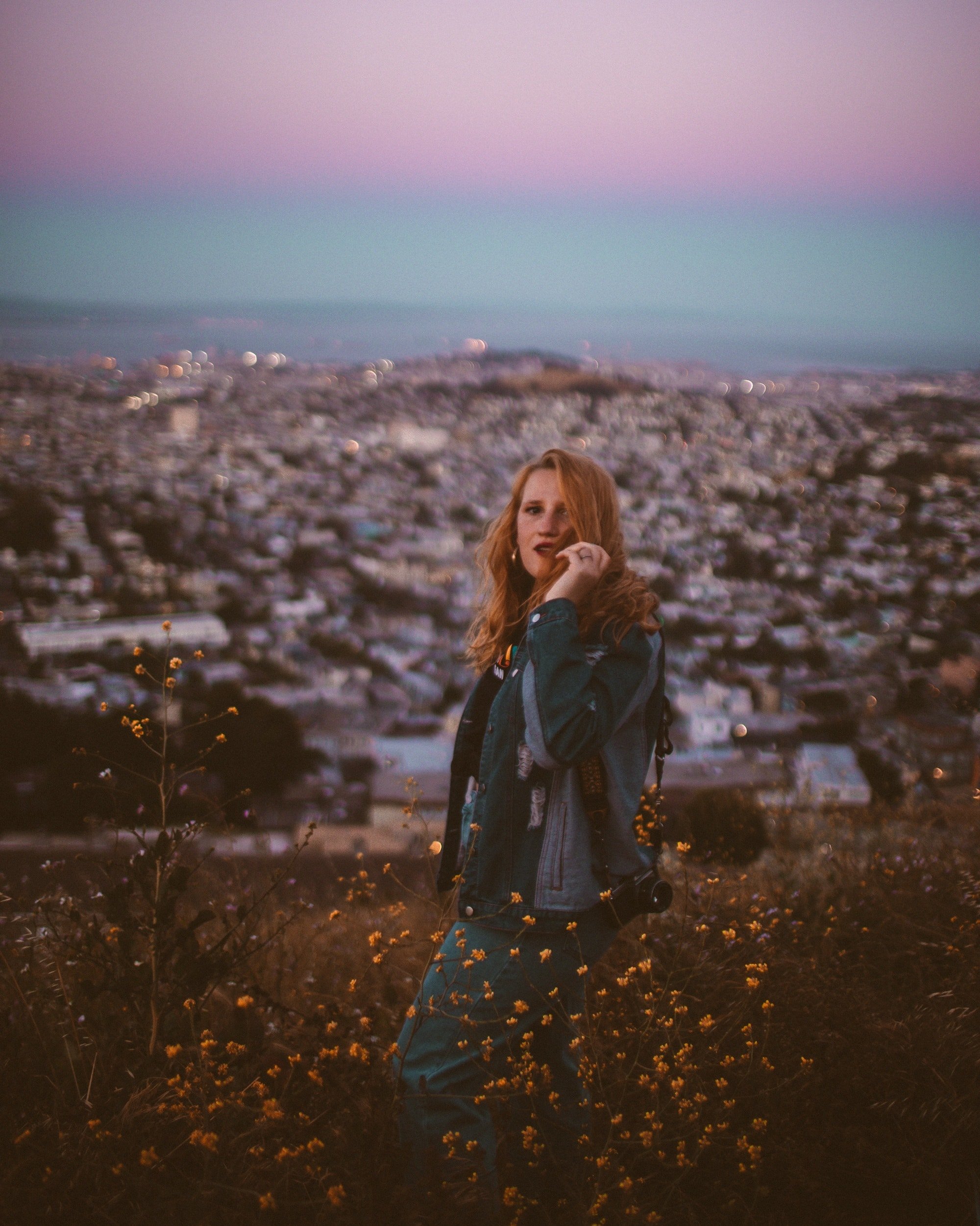 Woman Standing among Flowers at Twin Peaks lookout