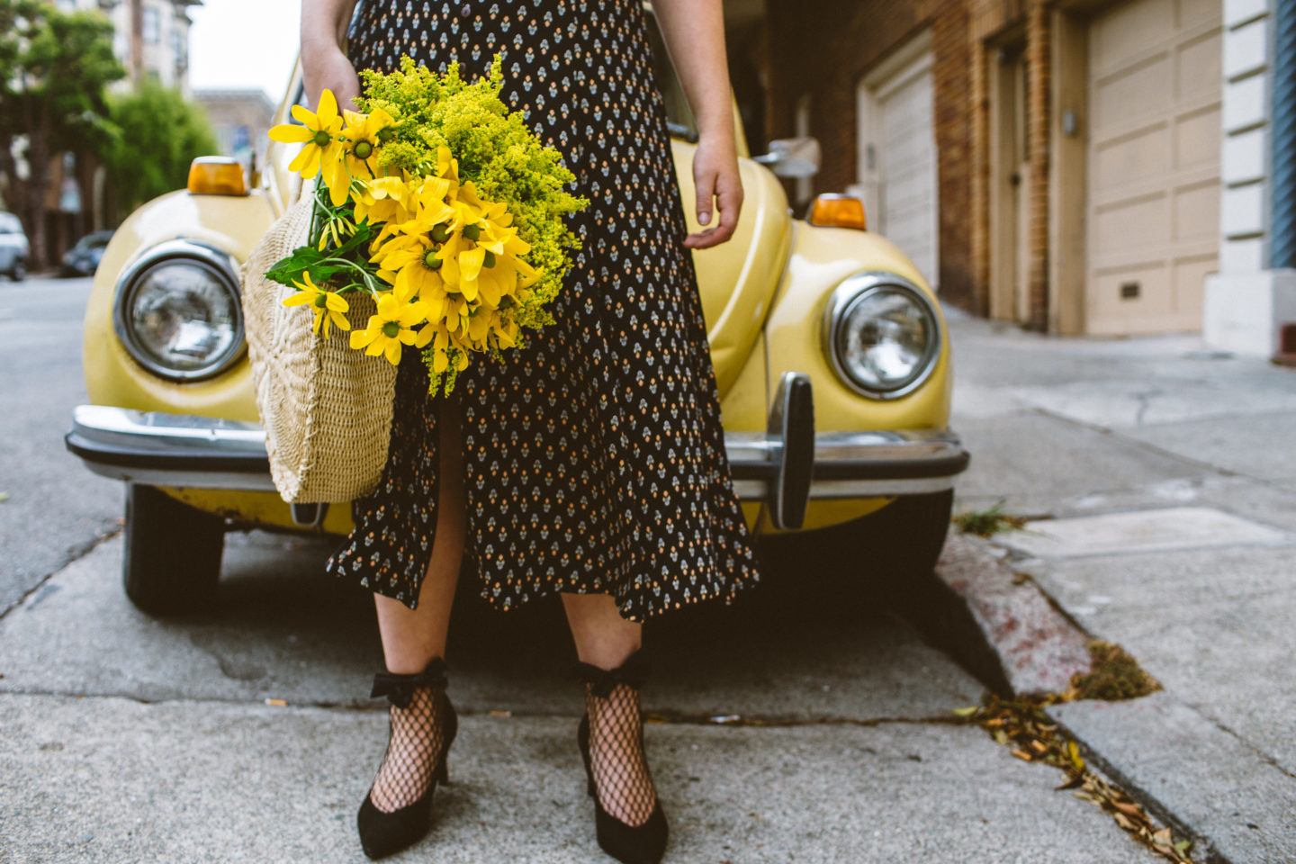 Every Curvy Woman Needs This Urban Outfitters Floral Midi Dress