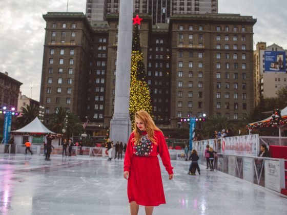 union square ice skate ugly Christmas sweater girl skating