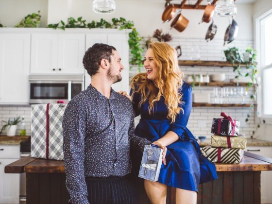 woman giving man a shaving gift set