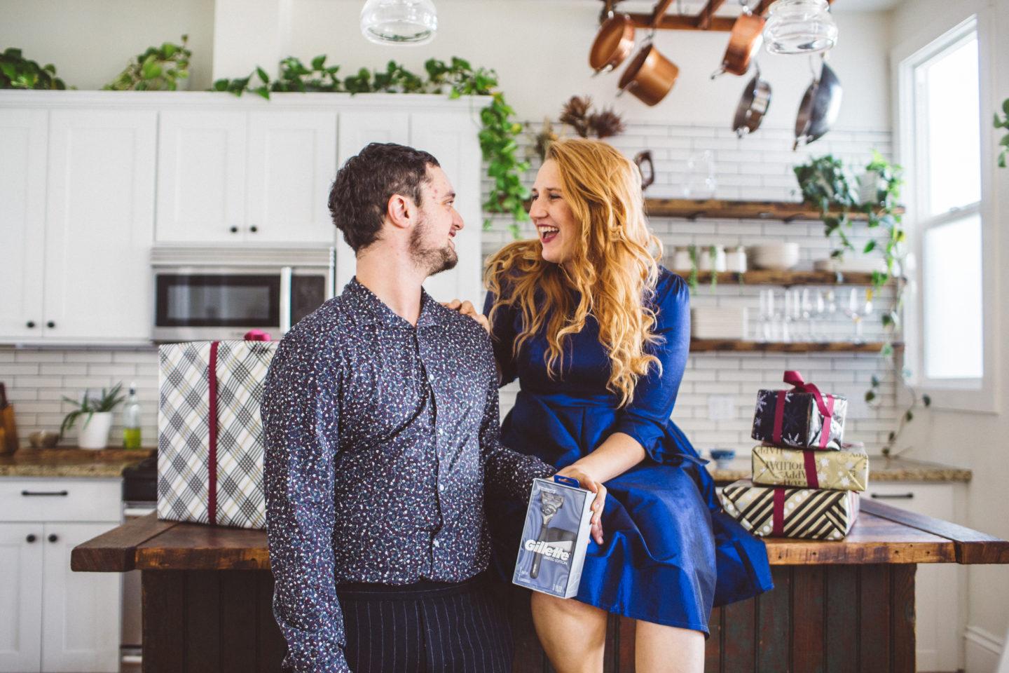 woman giving man a shaving gift set