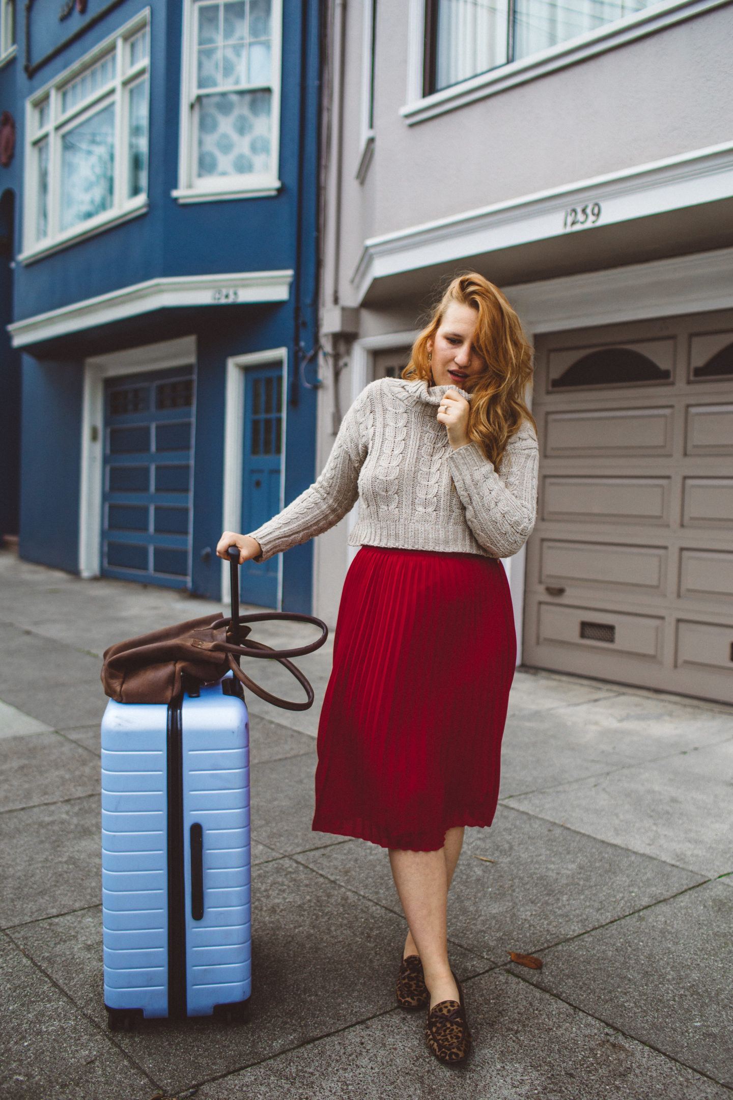 Midi Skirt with Sweater women's airport outfit ideas