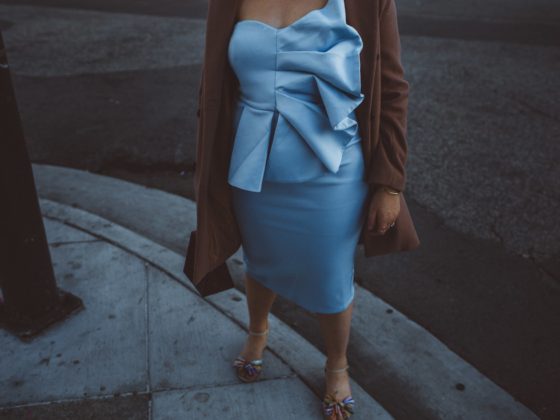 Woman wearing baby blue fan dress