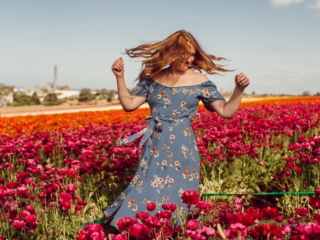 Wearing a blue floral pattern dress at the Carlsbad Flower Fields