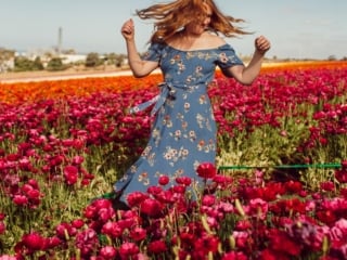 Wearing a blue floral pattern dress at the Carlsbad Flower Fields