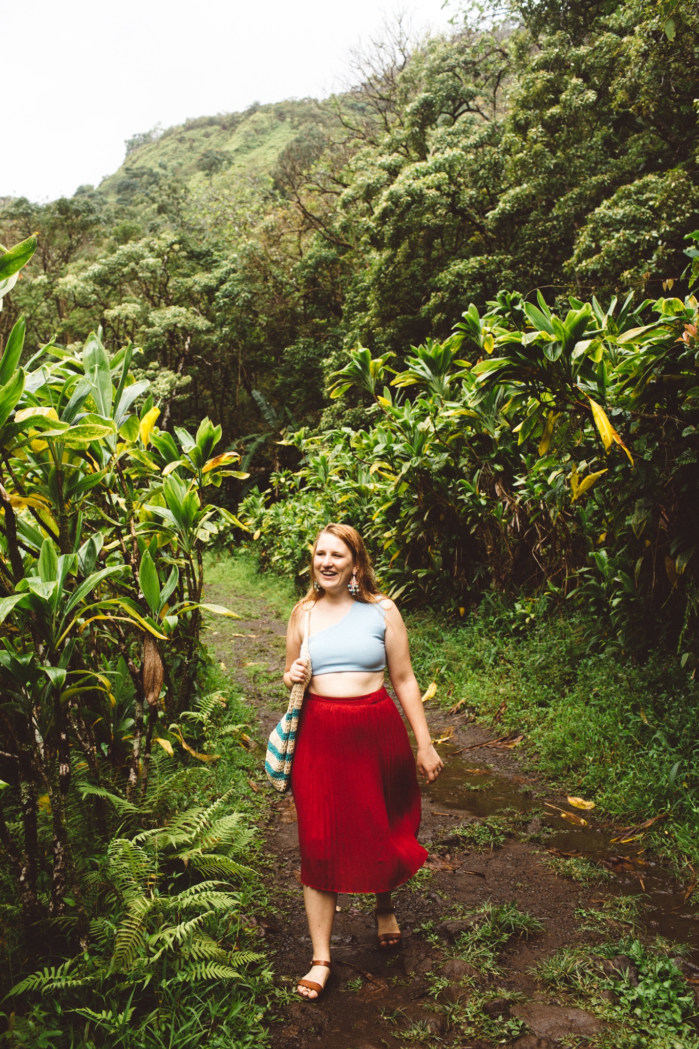 Two piece baby blue swimsuit paired with this great red skirt on the Road to Hana