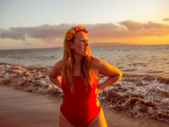 wearing my red swimsuit on Kiwakapu beach in maui