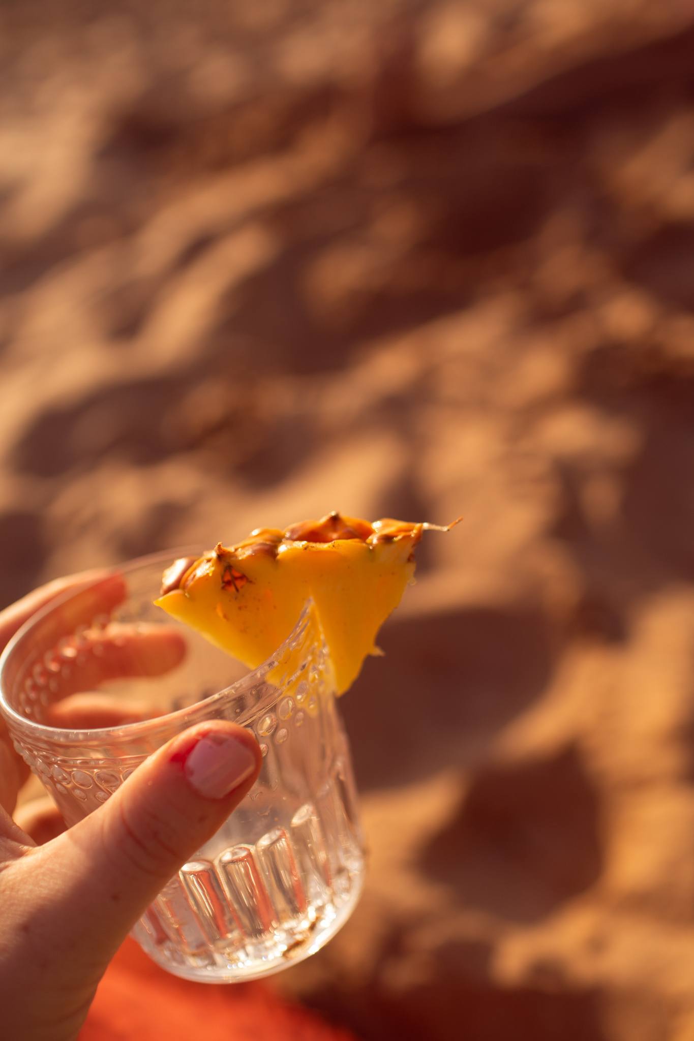 glass with pineapple garnish