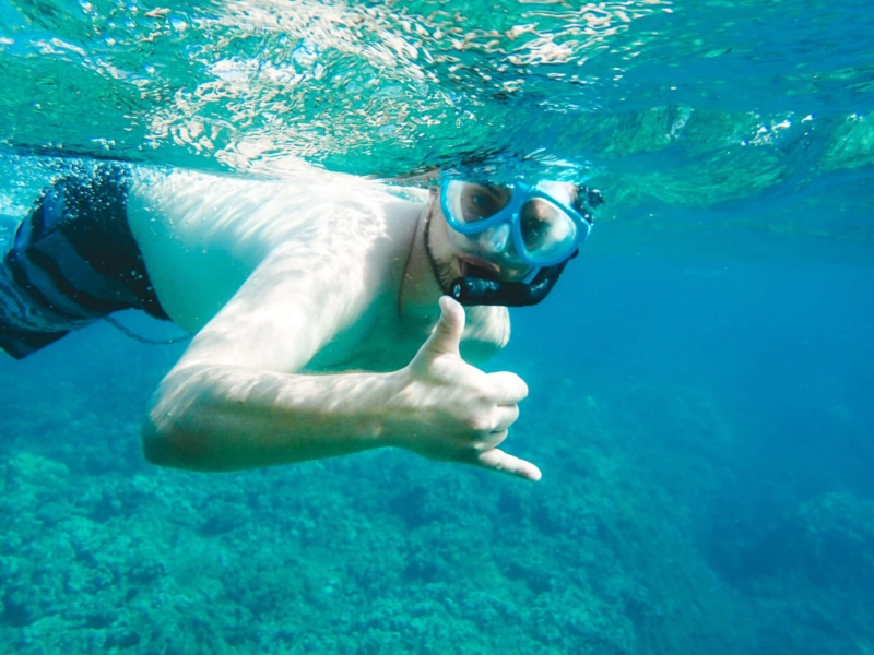 Snorkel Maui Hawaii Cruise - man snorkeling in coral reef