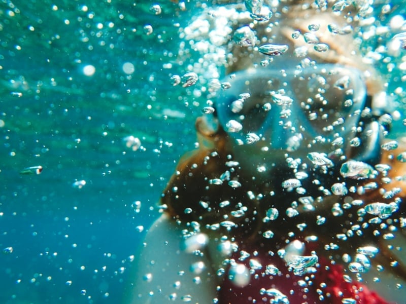 Snorkel Maui Hawaii Cruise - woman snorkeling in coral reef